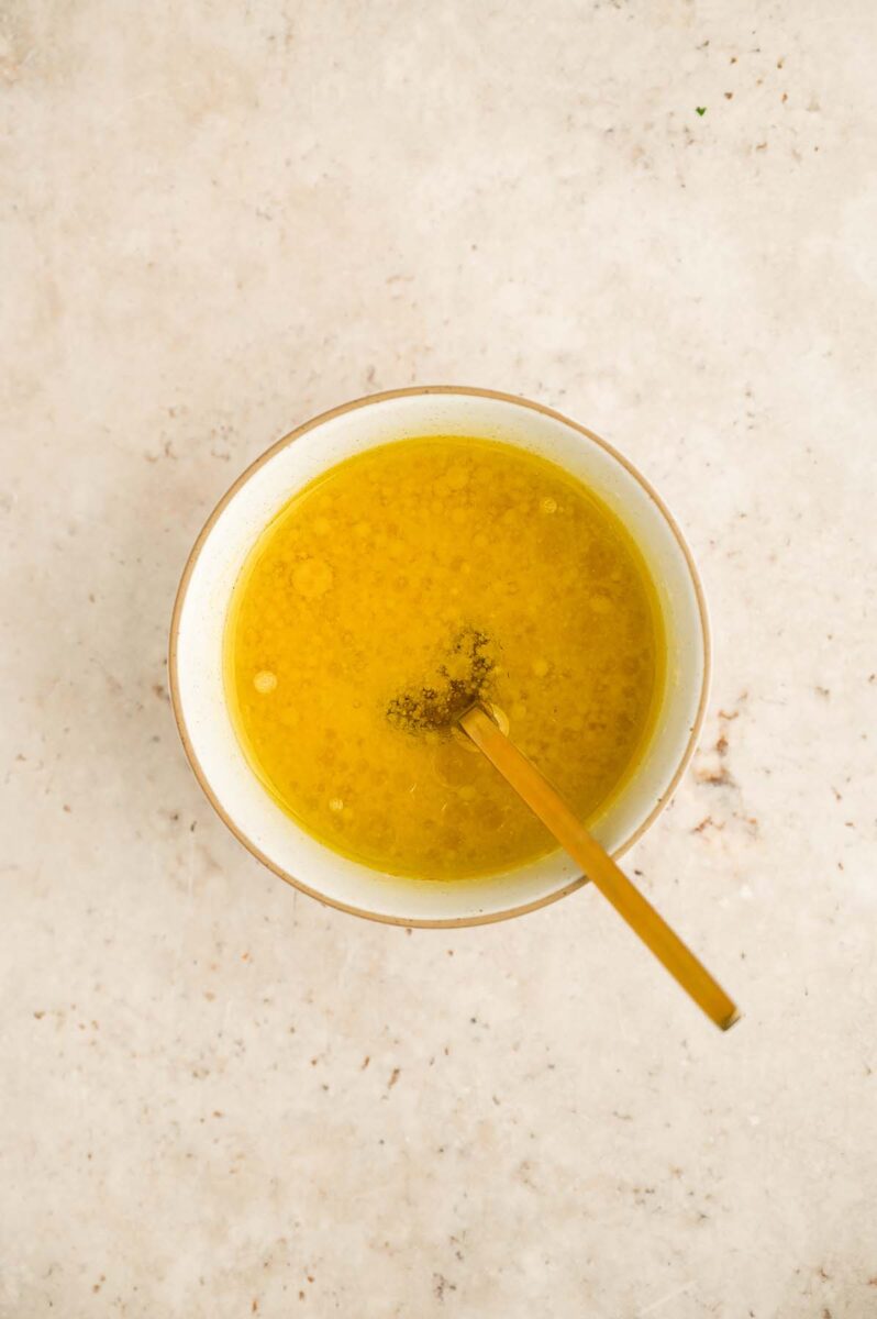 Easy farro salad dressing in a small bowl.