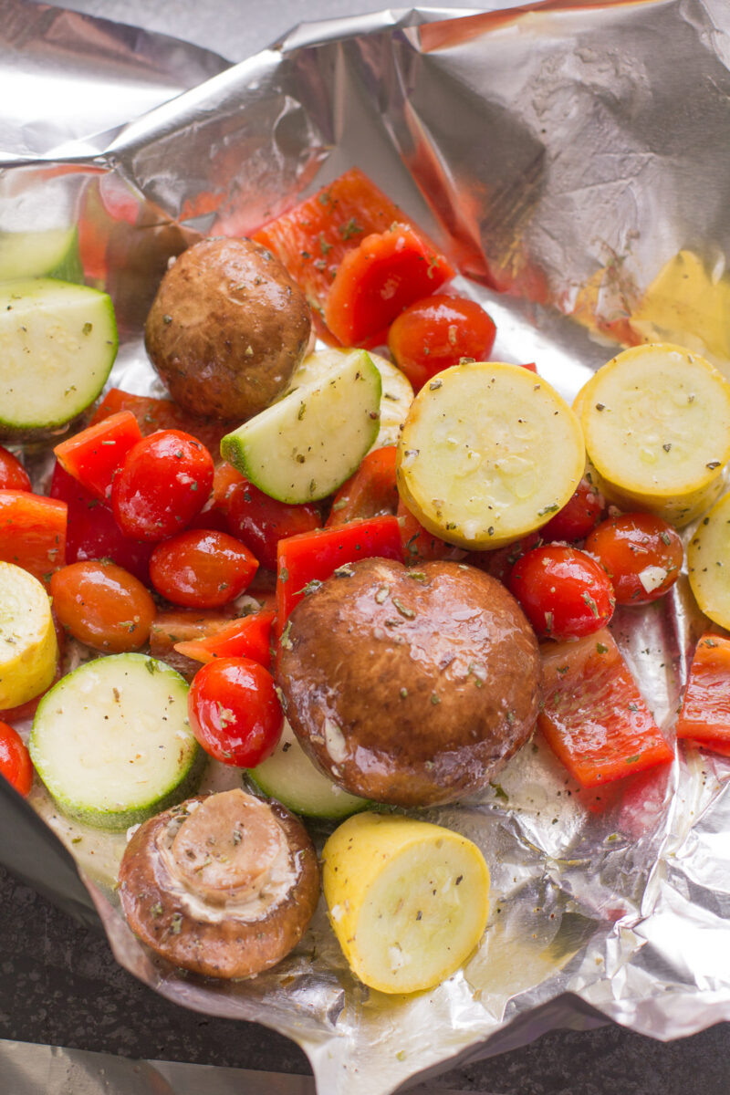 Vgetables in foil before being grilled.