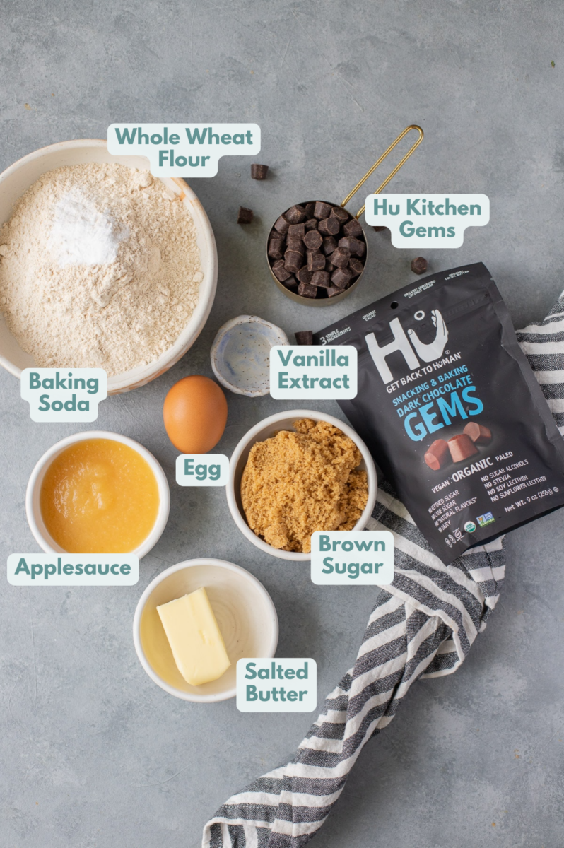 Ingredients for Whole Wheat Chocolate Chip Cookies in small white bowls on a grey background