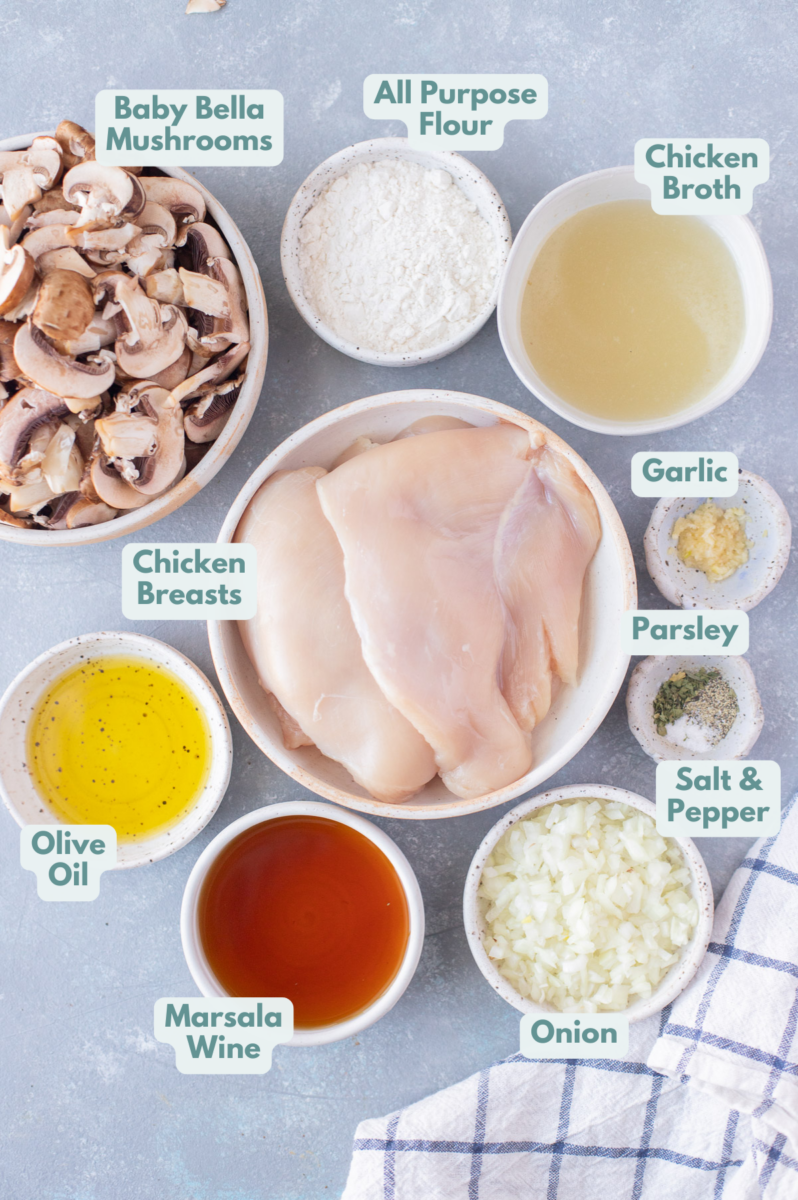 Ingredients for healthy chicken marsala in white bowls