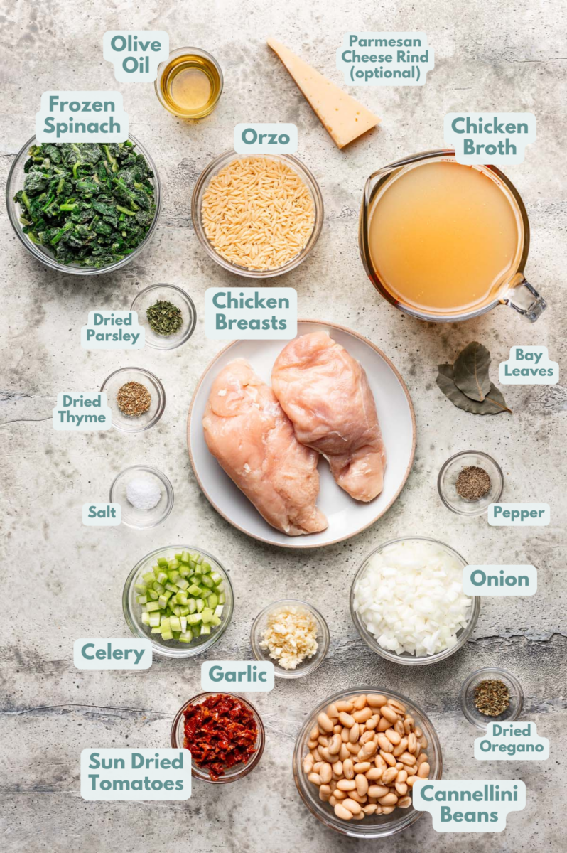 Labeled Tuscan Chicken Soup Ingredients in bowls and measuring cups on a counter.