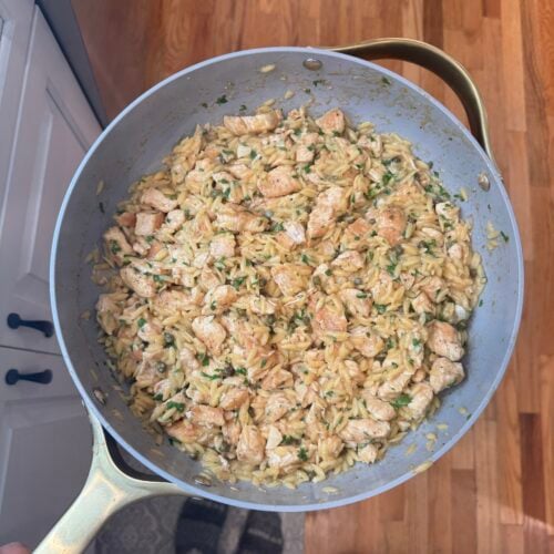 Chicken Piccata Orzo in a grey skillet