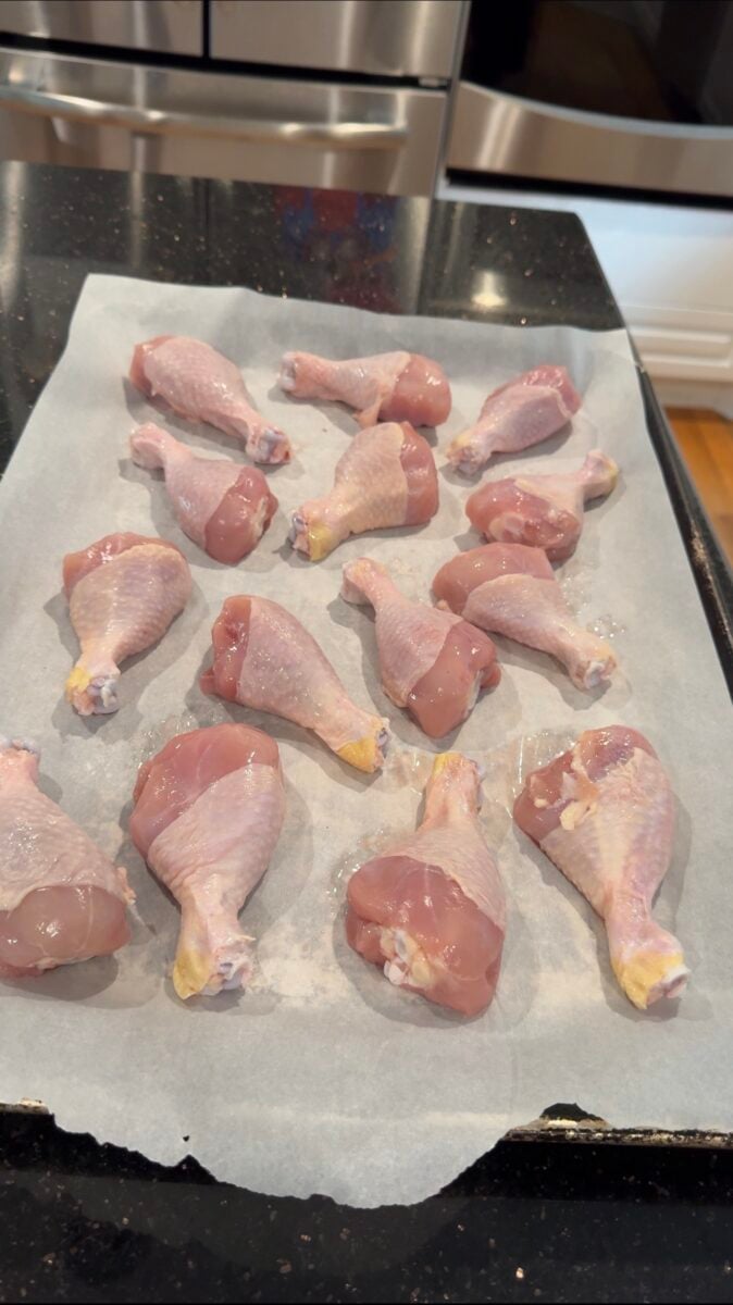 chicken drumsticks on a sheet pan